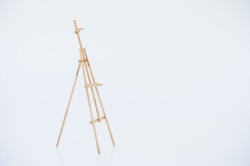 an empty easel isolated on a white background.