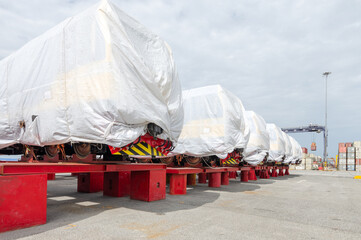 New diesel-electric locomotive awaits delivery at the deep sea port. © boygek