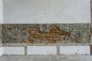 Old cracked concrete brick wall, grunge background