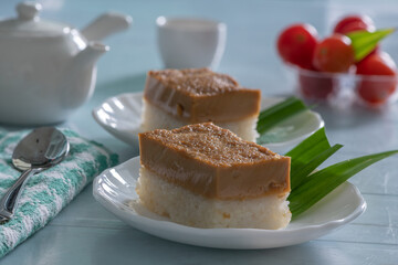 Pulut Sekaya, Glutinous Sticky Rice Palm Sugar Cake on a white plate