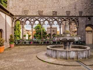 Viterbo, impressive view of the Loggia of the Papal Palace and its ancient fountain, Lazio, central...