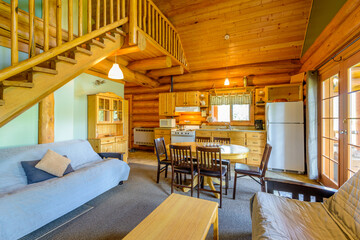 Modern dining room in log cabin or luxury house.