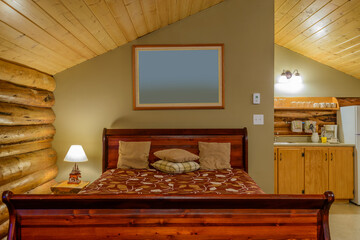 Beautiful and modern home and log cabin bedroom interior design.