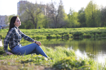 Fototapeta premium A girl travels the summer in the country