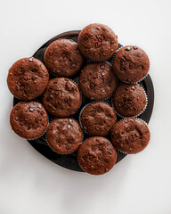 Delicious muffins with cocoa and chocolate