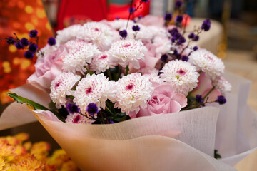 soft focused close up shot of beautiful pink mums flowers bouquet. Valentines day, birthday, anniversary, wedding present.