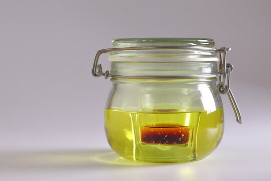 YELLOW MMS IN A GLASS BOTTLE