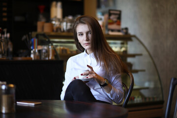 The girl in the cafe breakfast