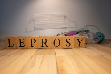 The word leprosy was crafted from wooden cubes. Health concept