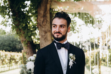 Portrait of the groom. Photoshoot of a successful businessman.