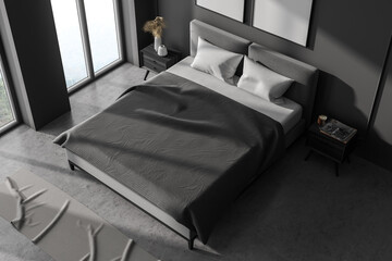 Grey bedroom interior with bed and linens, top view, mockup posters