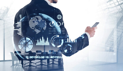 Businessman with phone in hand, hologram of earth globe and digital icons