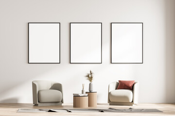 Modern living room interior with two armchairs and small table. Three mock up framed posters on white wall. Reading and relax concept. No people. 3d rendering.