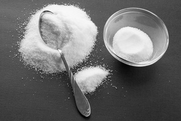 food salt with a spoon