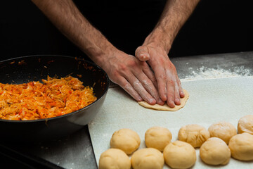 hands kneading dough