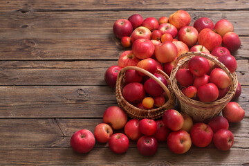 red apples on old wooden background