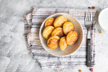 pancakes curd breakfast cottage cheese dessert cheesecake sweet syrniki healthy meal top view copy space rustic food background