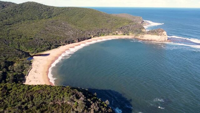 Drone aerial shot of Maitland bay Bushland coastline Bouddi National Park Killcare Central Coast NSW Australia 3840x2160 4K
