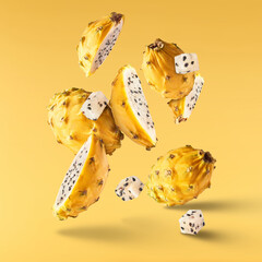 creative image with fresh yellow pitaya falling in the air, zero gravity food conception