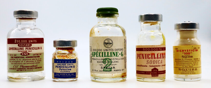 New York, USA – April 18, 2021: Vintage 1950s Vials of PENICILLIN G Produced by CSC Pharmaceuticals New York, PFIZER New York, SPECIA Paris, LEO Rome and SQUIBB Rome