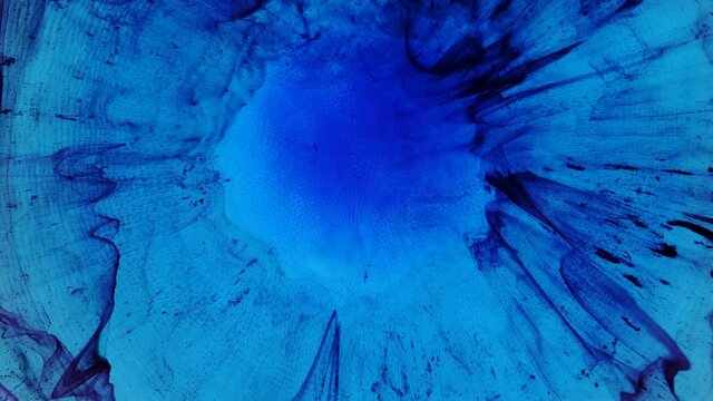 Abstract Grunge Color Ink Paint Spread Explosion Narrowing Space Explosion Background. Detailed background movement with blue, red, white rainbow colors.