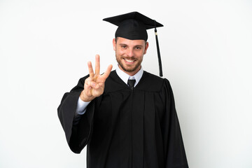 Young university Brazilian graduate isolated on white background happy and counting three with fingers