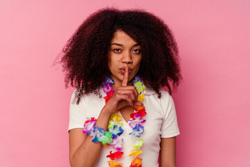 Young african american woman wearing a hawaiian stuff keeping a secret or asking for silence.