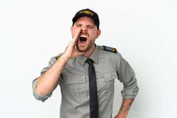 Young security Brazilian man isolated on white background shouting with mouth wide open