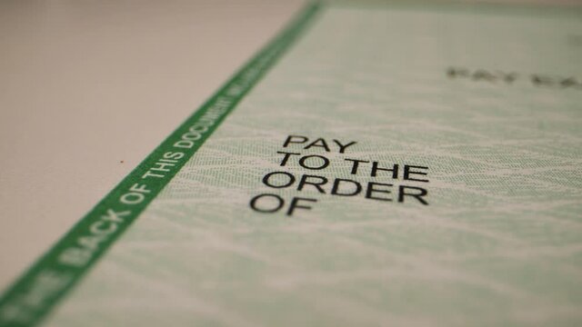 pay to the order of written on a check