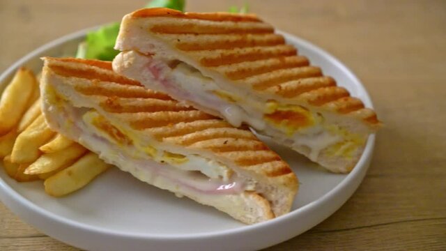 ham cheese sandwich with egg and fries