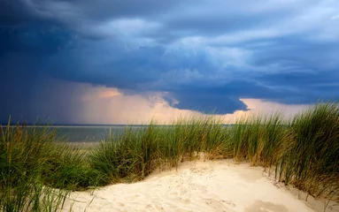 Fotobehang Traumhafte Wolkenstimmung über der Nordsee © helmutvogler