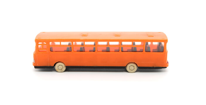 toy bus (model) made of plastic on a white background, isolated object