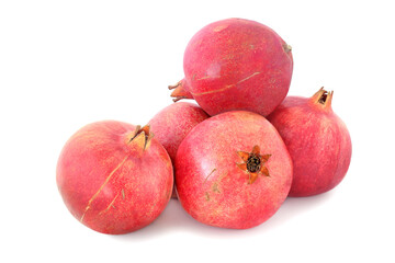 Several ripe pomegranates with isolated on white