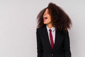 Young African American business woman wearing a suit isolated on white background shouting towards a copy space