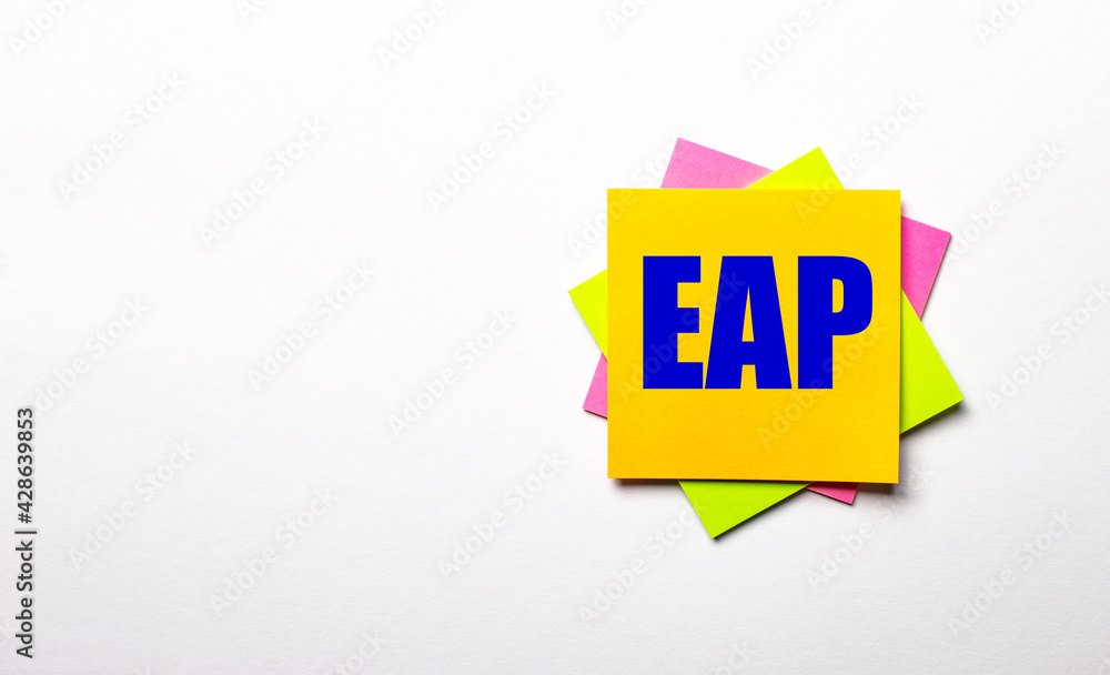Poster on a light background - bright multicolored stickers with the text eap employee assistance program. 