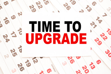 text TIME TO UPGRADE on a sheet from Notepad.a digital background. business concept . business and Finance.