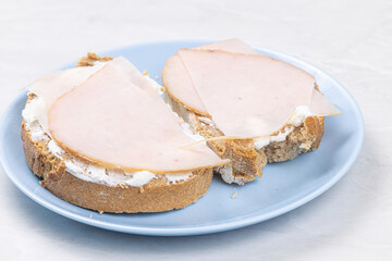 Brakfast sandwich with ham and cheese