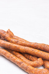 Homemade fresh raw smoked sausages with copy space