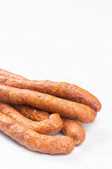 Homemade fresh raw smoked sausages with copy space