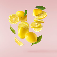 creative image with fresh lemons falling in the air, zero gravity food conception