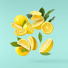 creative image with fresh lemons falling in the air, zero gravity food conception