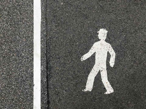 pedestrian  on asphalt