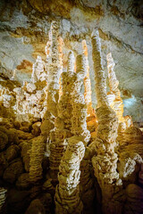 Cave interior with stalactite and stalagmite