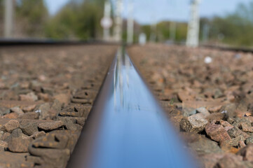 A photo of a railroad rails close up