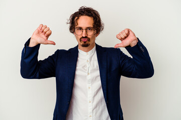 Young business man isolated on white background feels proud and self confident, example to follow.