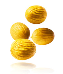 Fresh raw melon falling in the air isolated on yellow