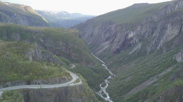 Road and river in mountains from aerial view