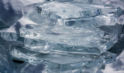 Scenic winter lake Baikal landscape with huge pressure ridge transparent ice blocks on the surface