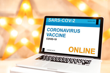 online health appointment, booking or reserve coronavirus or covid-19 vaccine in concept social distance healthcare in quanrantine people at home using laptop computer.