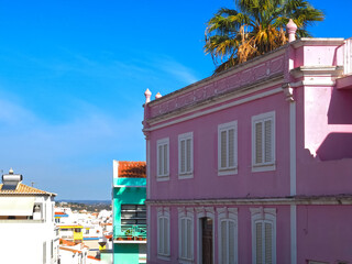 Beautiful cityscape of the city of Lagos, Algarve, Portugal with a pink house